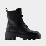 T-Monogram Lug Ankle Boots - Tory Burch - Leather - Black