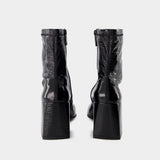 Reedition Ankle Boots - Courreges - Vinyl - Black