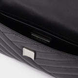 Kira Chevron Small Flap Shoulder Bag in black leather