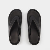 Rise Thong Sandals in Black Canvas