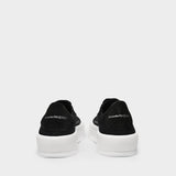 Deck Sneakers in Black Canvas and White Sole