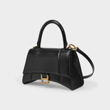 Hourglass Top Handle S Bag in Black Shiny Leather
