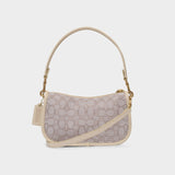 Swinger Bag in Stone Ivory Canvas