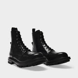 Laced Boots in Black Patent Leather